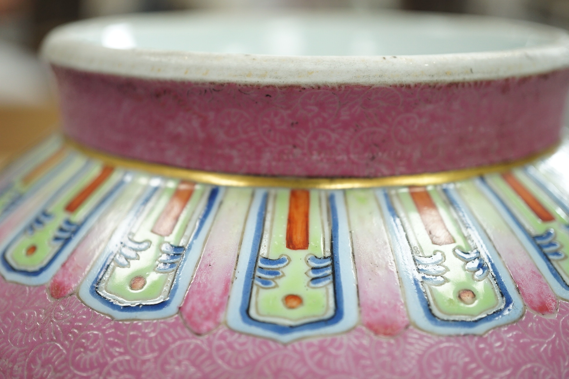 A Chinese pink-ground sgraffito pear-shaped vase, yuhuchunping, Daoguang six character seal mark and of the period (1821-50)